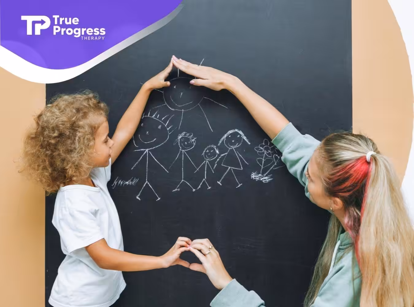 Child and BCBA drawing a family picture on chalkboard during ABA therapy.