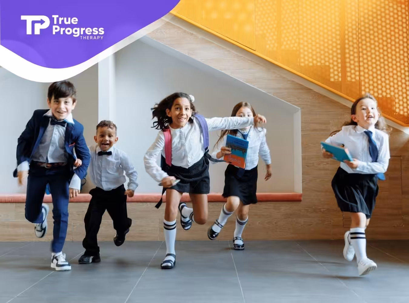 Group of children with autism dressed formally to school, running down a hallway in New Jersey.