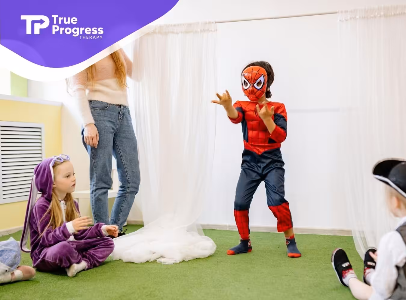 Autistic child dressed as Spider-Man performing at a classroom in New Jersey with peers in costumes.