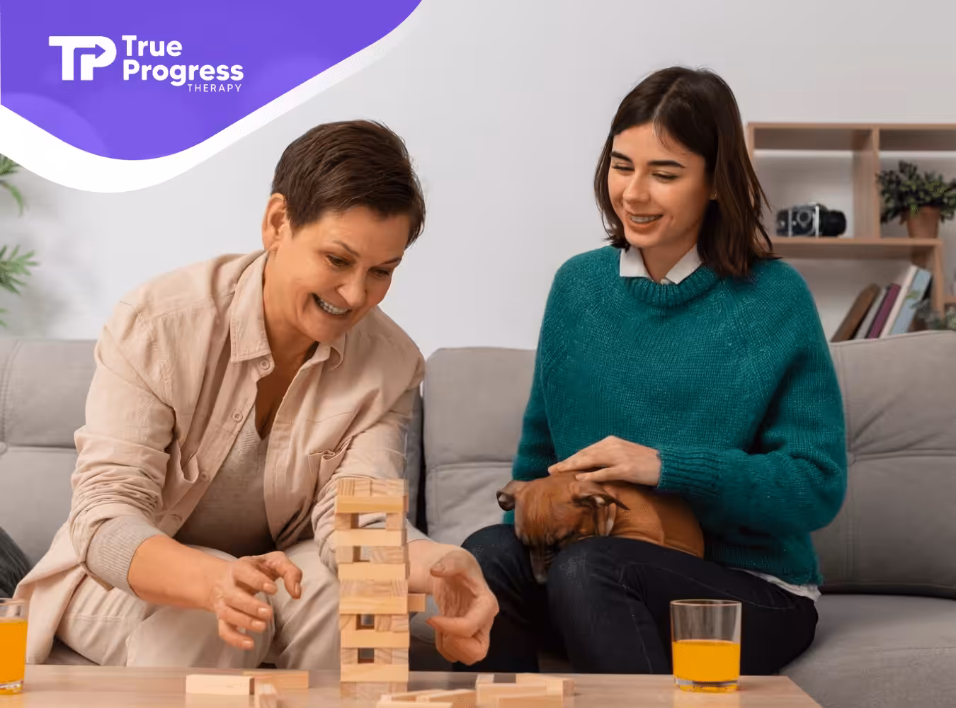 Two adults playing Jenga