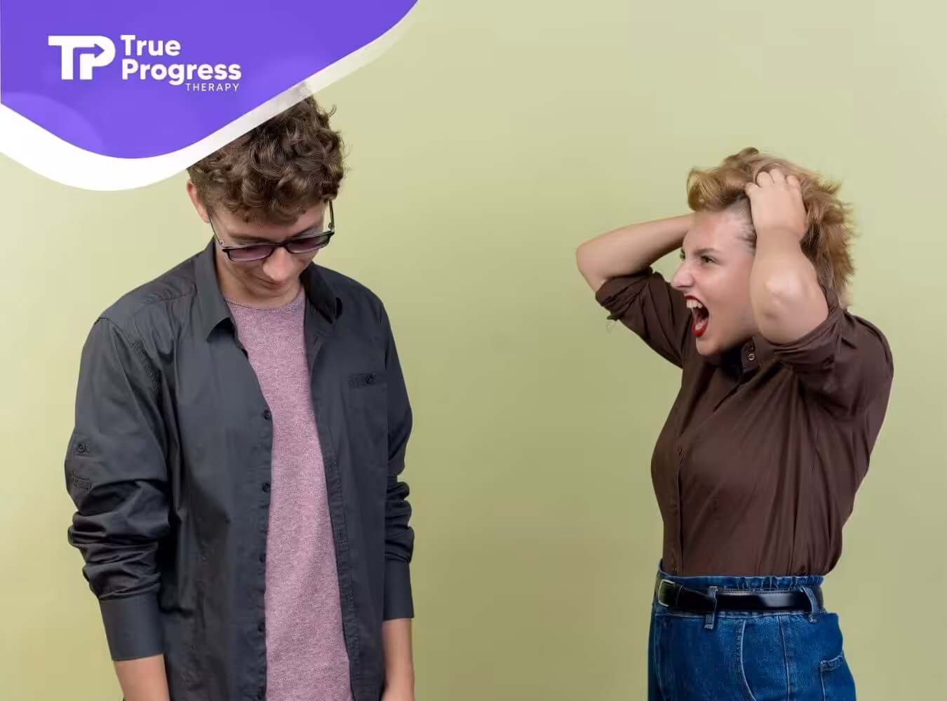 A young couple in casual clothes, the woman with autism is angrily yelling while the man looks down.