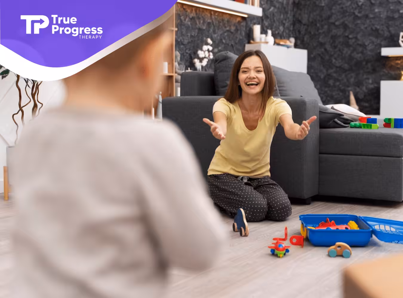 An RBT playing with an autistic child during in-home ABA therapy