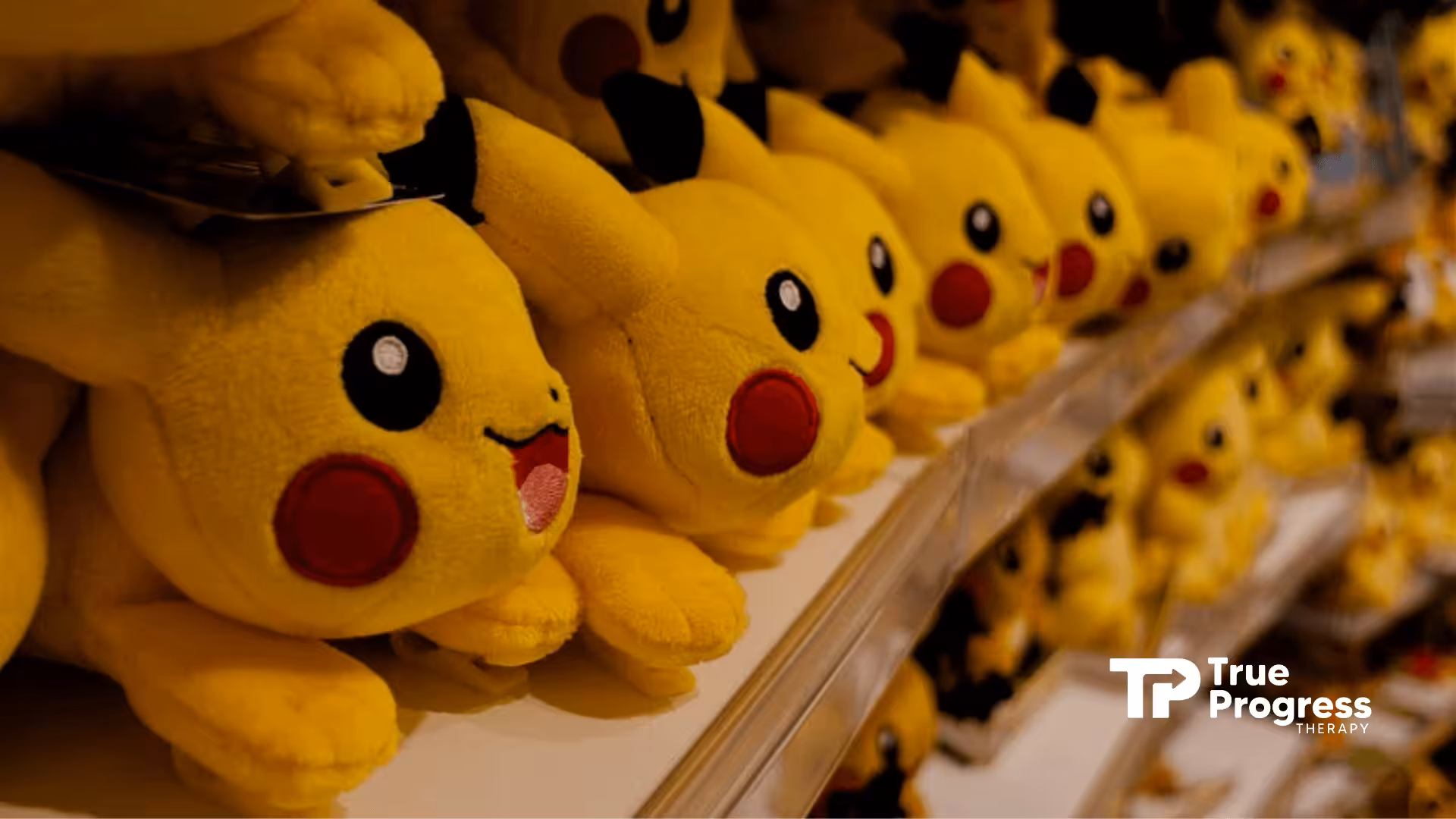 Pikachu plush toys on store shelf, one of the Pokemon characters created by Satoshi Tajiri, who's suspected of autism.