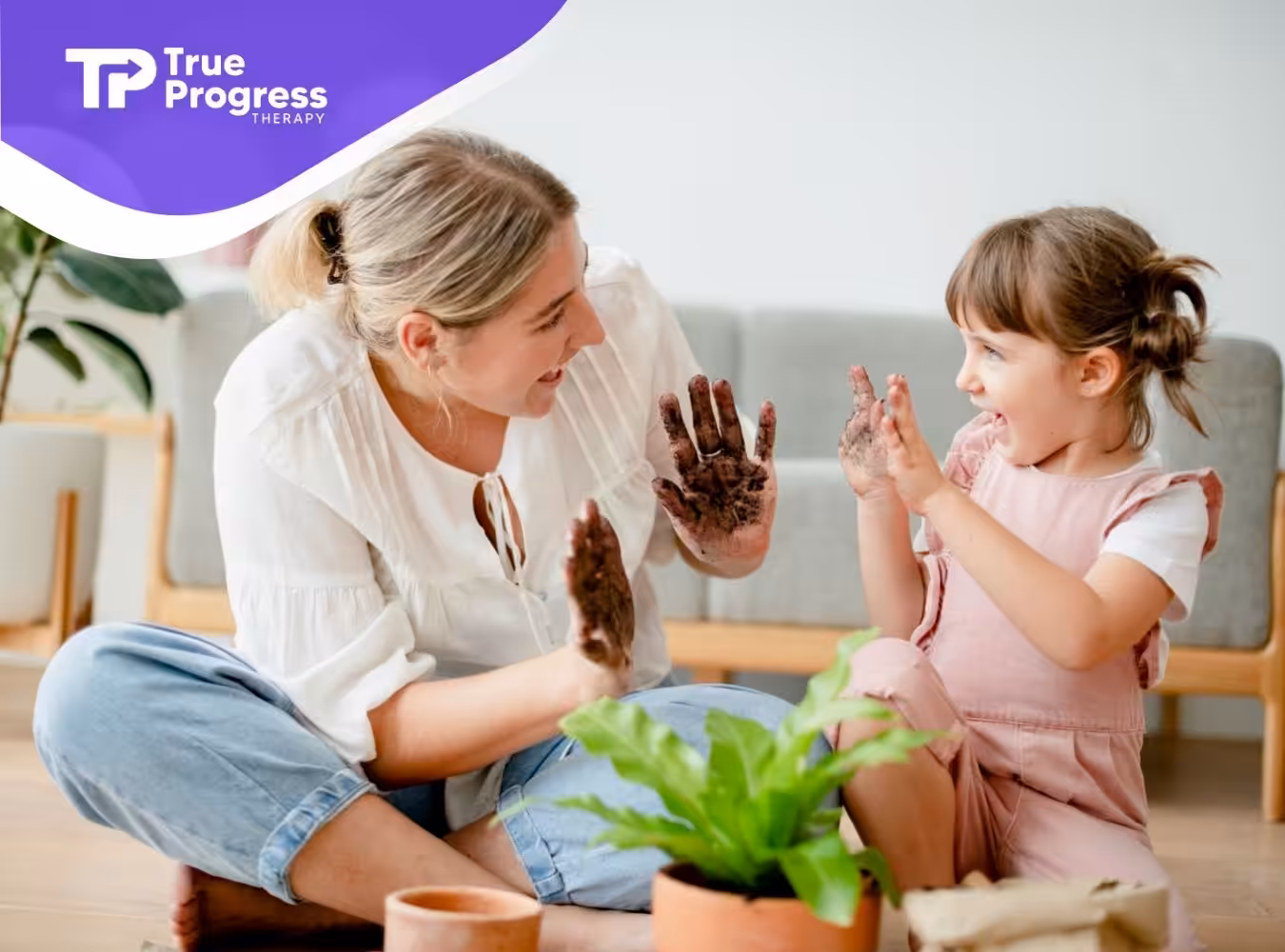 A mother and daughter enjoying a gardening activity.