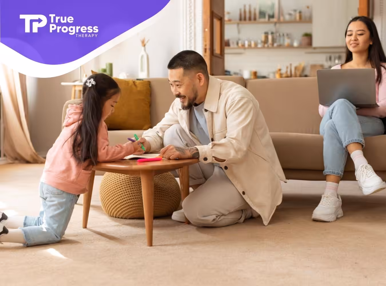 An ABA therapist working with a child while the mother observes from the couch.