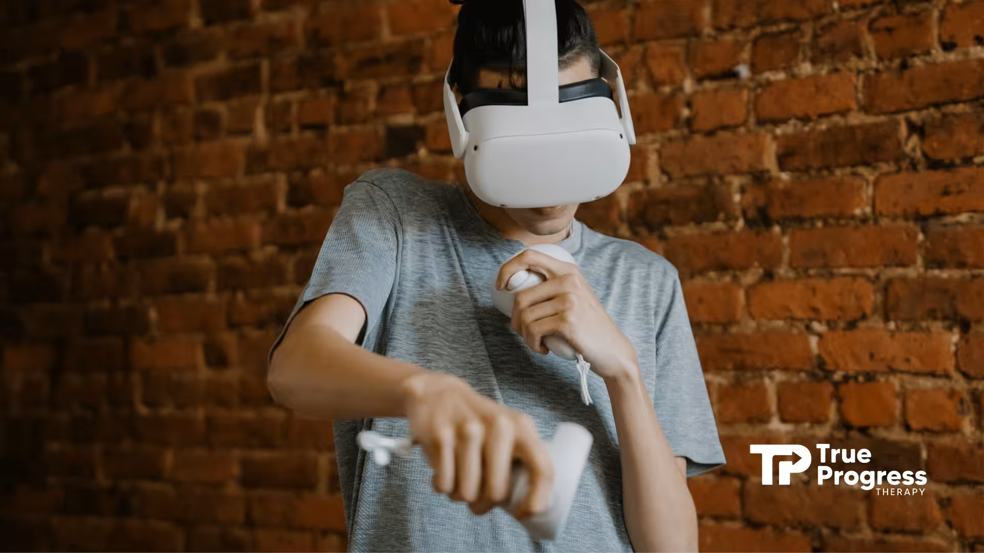 An autistic teenager using a virtual reality headset and controller in a brick-walled room during ABA therapy in NJ.