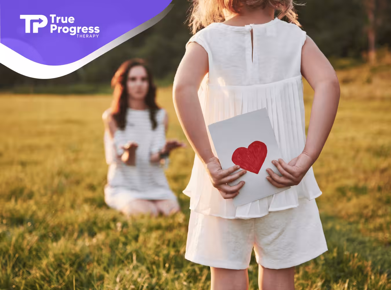A child with autism facing her mom with a love letter behind her