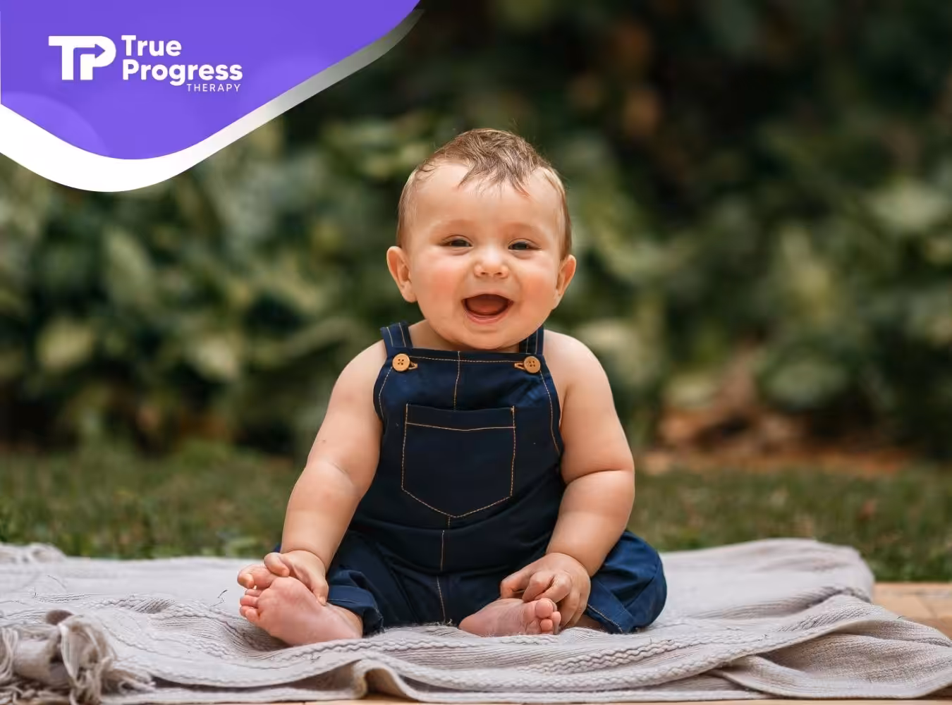 do babies with autism smile