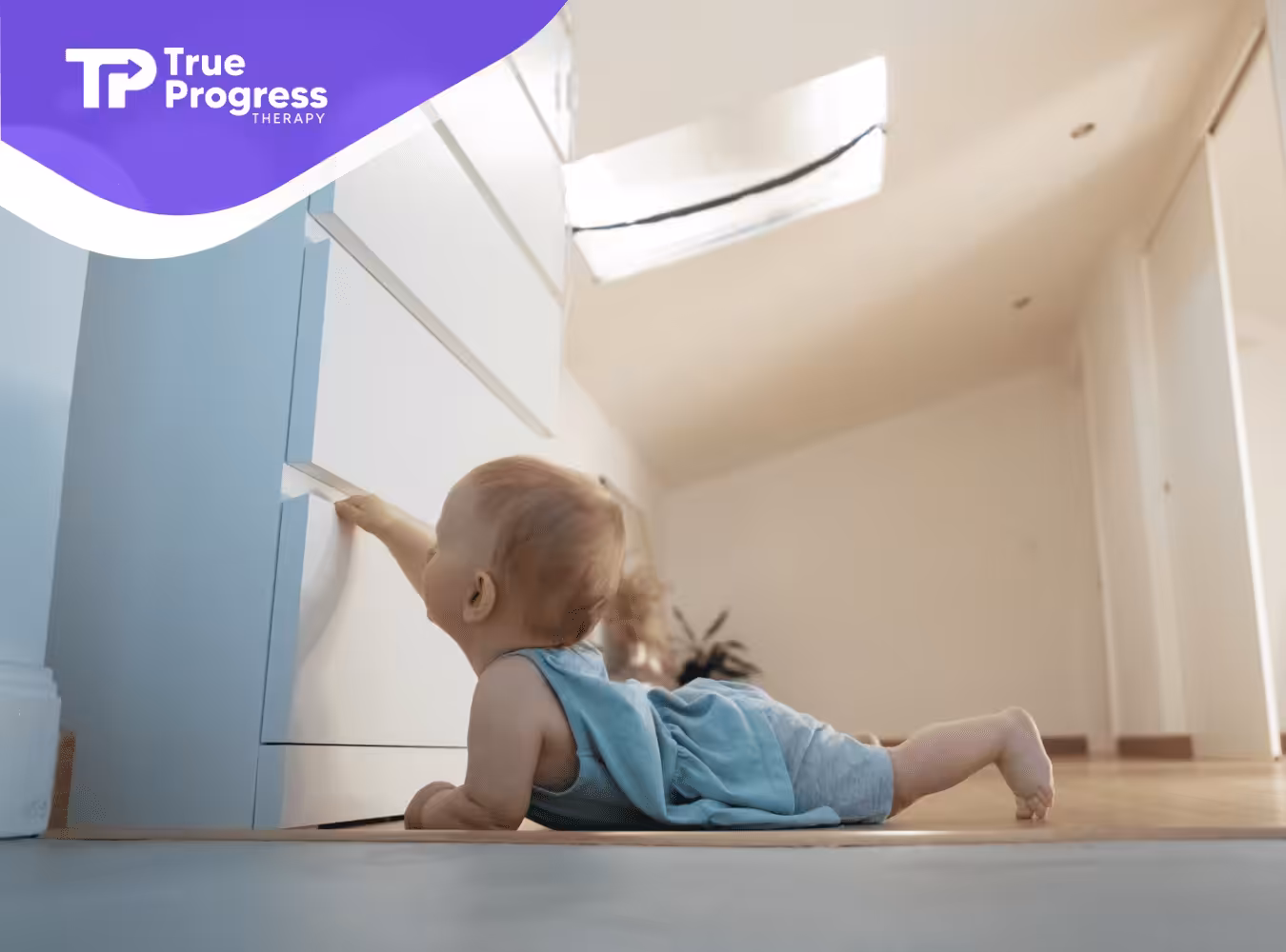 A toddler with autism is trying to open a drawer alone