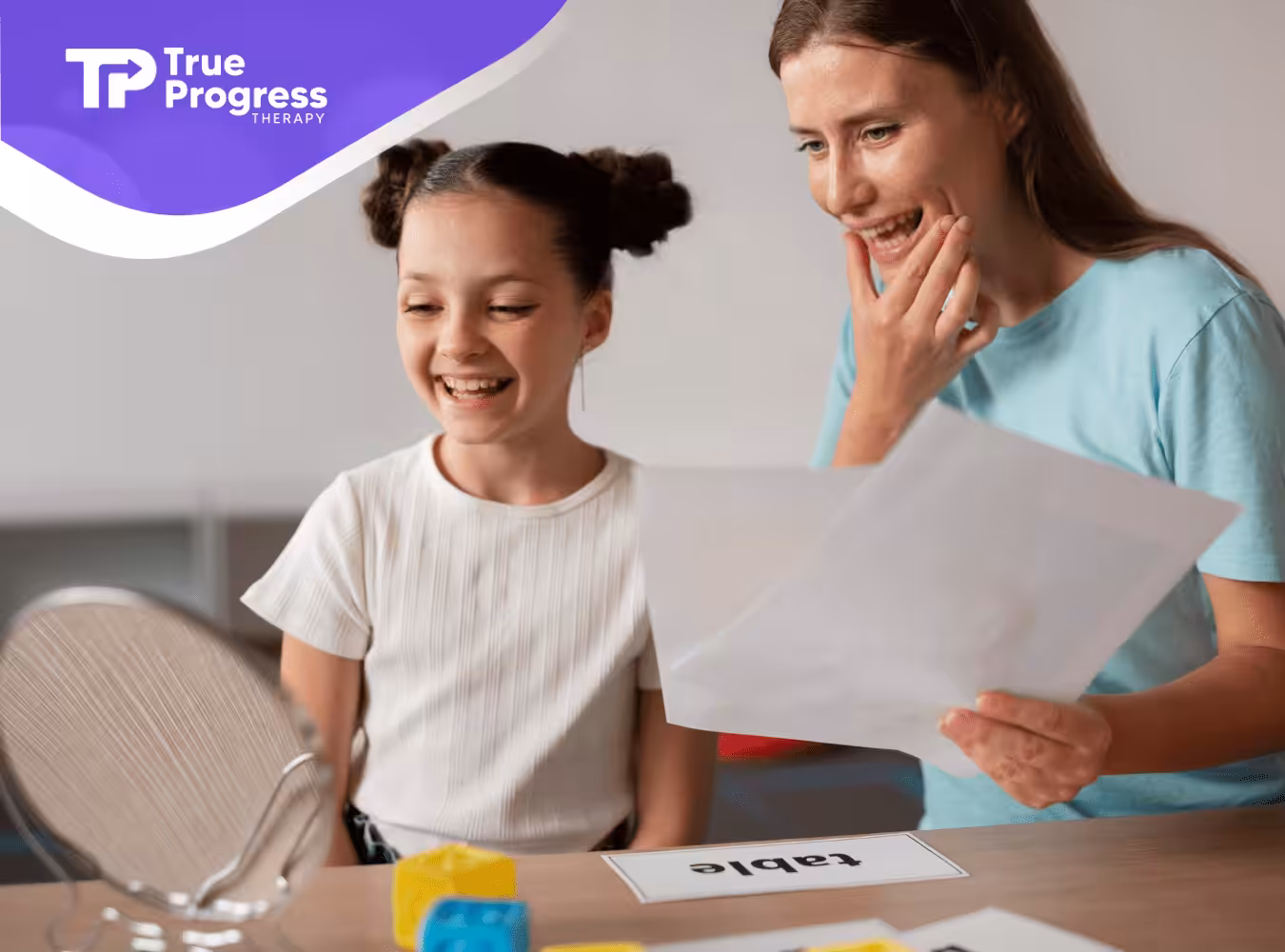 A mom is helping her autistic daughter talk