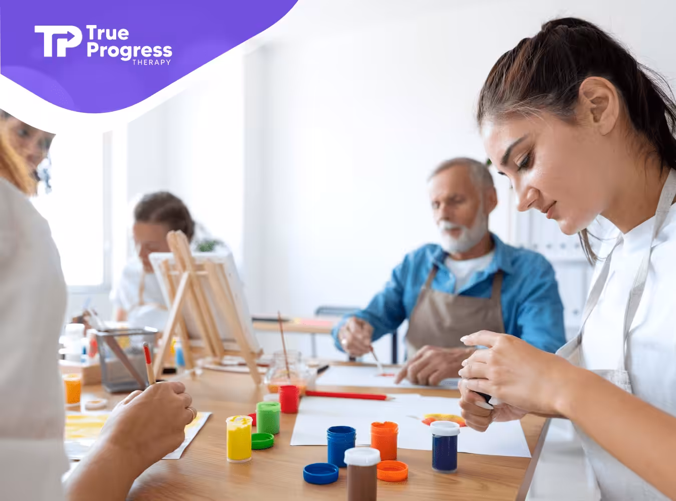 A group of autistic adults during their painting activity