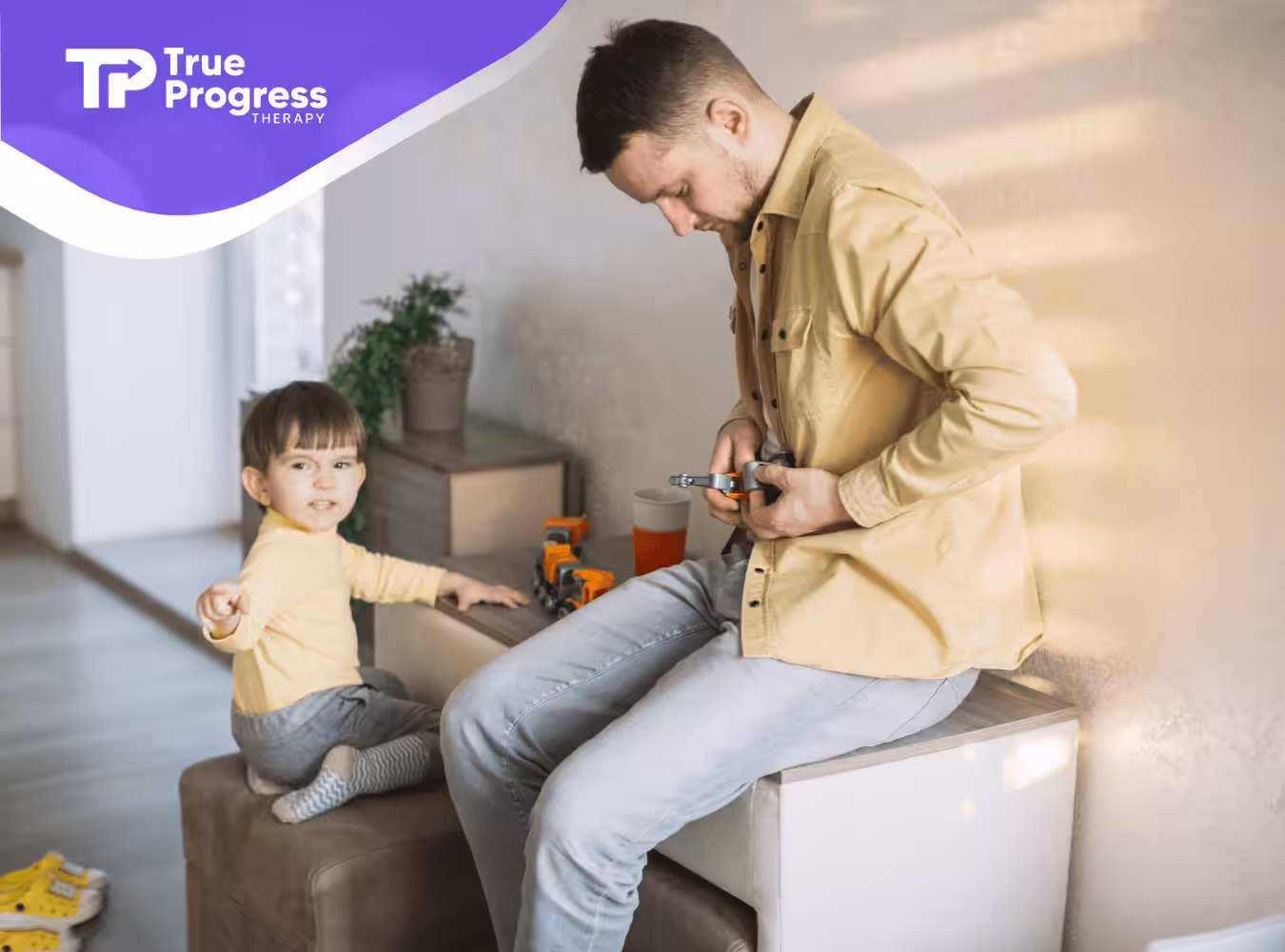 A father playing with his child with autism