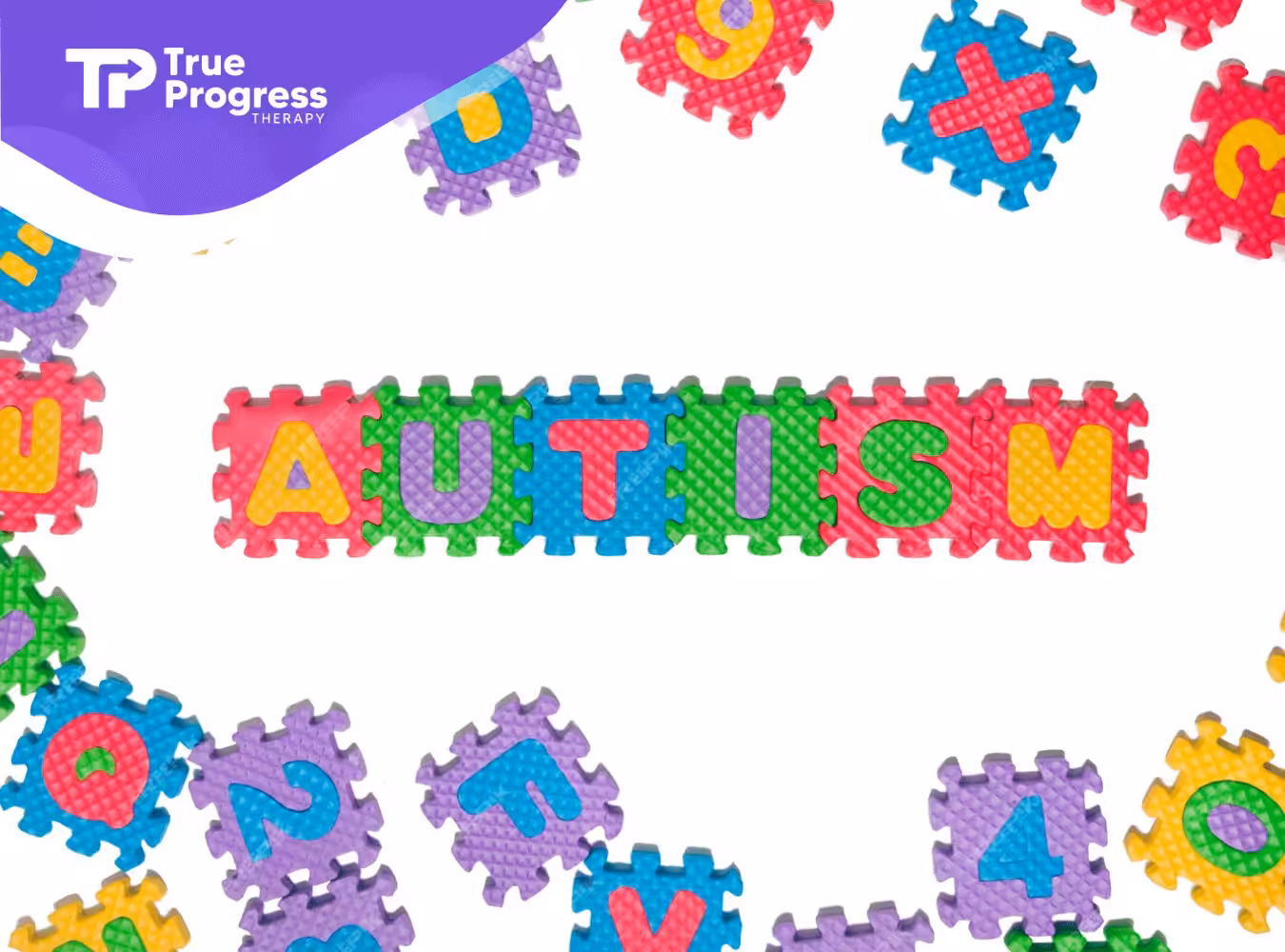 Colorful puzzle letters spelling the word "autism"