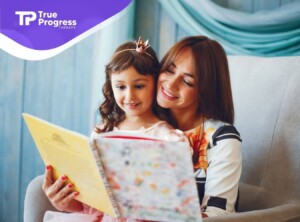 Mother and child reading together for autism support.